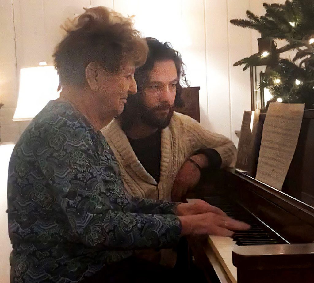 Joe watches as grandmother Lorraine Shadid plays piano. His family helped fuel Joe Shadid’s love and career of music